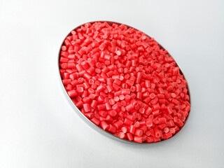 Red masterbatch granule, red pigment, red polymer granules in a cup, cold cutting type granule...