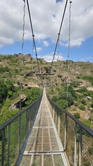 suspension bridge in the mountains