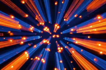 Fototapeta premium Bright radial light beams create an abstract background featuring blue and orange neon colors A stunning light burst evokes a cosmic atmosphere for various occasions