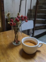 cup of coffee and flowers
