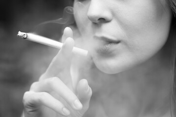 person smoking cigarette