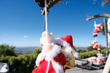 Santa Claus is a doll that represents the important day of Christmas. It is a simulation of climbing a rope to decorate Christmas.