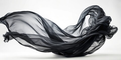 Silky black tulle flows effortlessly in the gentle breeze, its soft folds undulating like a dark, velvet whisper through the serene landscape.