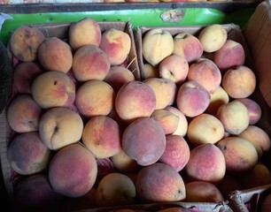 Fresh delicious Peach fruits in a shop
