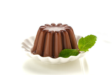 Chocolate pudding with mint leaf
