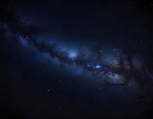 Fototapeta premium A clear night sky filled with shimmering stars over a dark blue atmospheric backdrop
