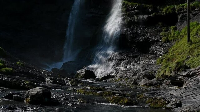 Cascade du Rouget Falls with powerful flowing water from rushing river in Sixt-Fer-&agrave;-Cheval National Park