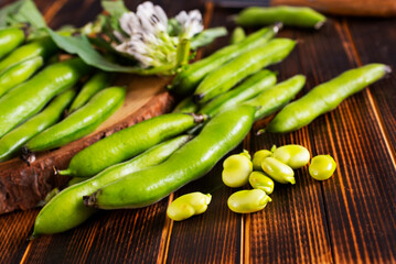 Soybean on wooden table, raw beans