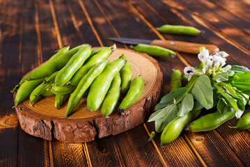 Soybean on wooden table, raw beans
