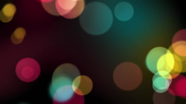 Abstract looping motion background with flying particles. Animated overlay with bokeh colored lights, seamless loop.
