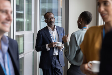 Mature African American businessman at a corporate networking event