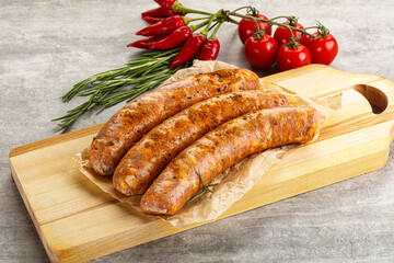 Raw sausages with spices and herbs