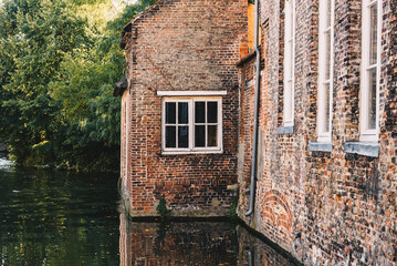 Old Brick Building by a Canal in Belgium