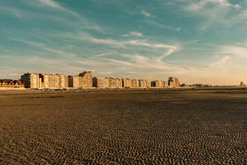 Residential buildings on the sea shore during low tide