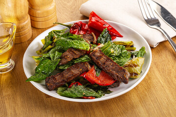 Salad with grilled beef steak