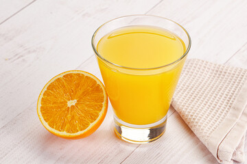 Sweet fresh orange juice in the glass