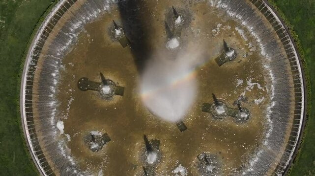 Abstract aerial urban scene of a round fountain in Omonia square in Athens Greece, viewed from above