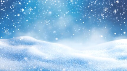 Delicate white snowflakes gently fall against a soft, blurred blue background, creating a serene winter scene. The snow-covered landscape adds a peaceful, seasonal ambiance.