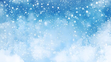 Obraz premium Delicate white snowflakes gently fall against a soft, blurred blue background, creating a serene winter scene. The snow-covered landscape adds a peaceful, seasonal ambiance.