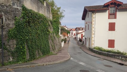 Beautiful old coastal Basque town in France, red and white buildings
