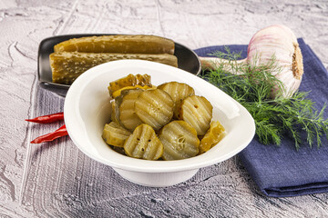 Sliced marinated cucumbers in the bowl