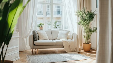 Bright living room with a stylish sofa, indoor plants, and natural light streaming through large windows, creating a cozy minimalist atmosphere.
