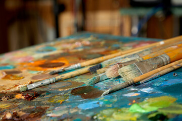 Fototapeta premium Oil paints palette and paint brushes