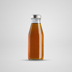 Mockup of a glass bottle with apple juice, isolated on a white background.