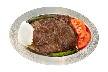 Top view traditional turkish meat and food service, Top view of sliced doner kebab with pita bread, pepper and tomato isolated on white background.