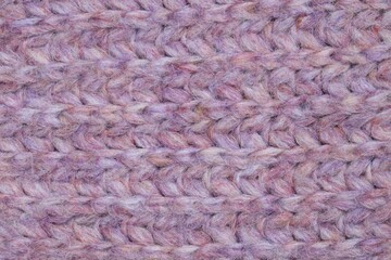 Texture of bright knitted fabric as background, top view