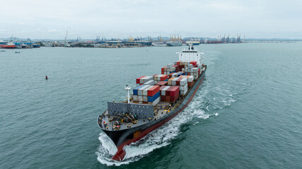 logistic cargo container ship sailing in sea to import export goods and distributing products to...