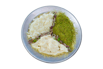 Raw katmer with clotted cream and pistachios served on a metal plate with lots of pistachios on top. top view, white background.
