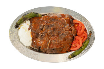 Top view traditional turkish meat and food service, yogurt doner with sauce. isolated on white background.