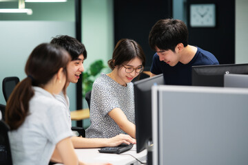 Fototapeta premium Portrait of a team of students enthusiastically solving tasks on a programming and machine learning course, the portrait reflects cooperation and innovation in a modern work environment.