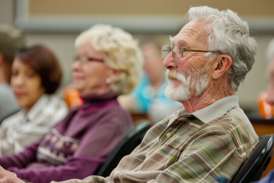 Elderly Individuals Engaged in a Community Seminar or Workshop Setting