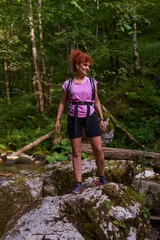 Naklejka premium Woman hiker by the river