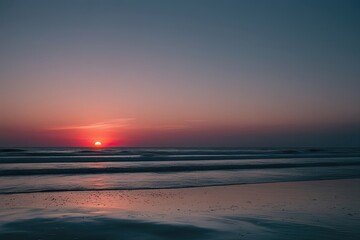 Obraz premium Artistic Sunset Illuminating the Tide on a Simple White Backdrop