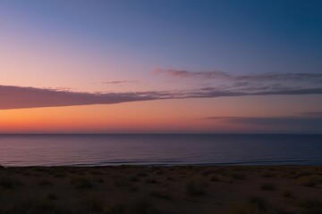 Obraz premium Enchanting Sunset Stretching Across the Ocean with a Plain Backdrop