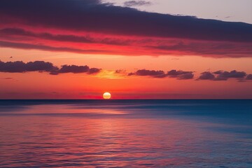 Obraz premium Serene Sunset Reflection on Colorful Waters with Peaceful Horizon View