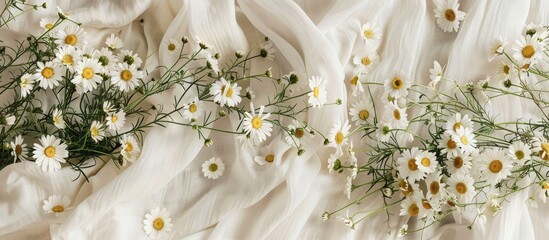 Fabric canvas burlap backdrop scattered with daisies and a white sticker. with copy space image. Place for adding text or design