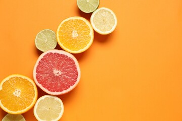 Tropical fruits on color background. Summer concept. Flat lay, top view, copy space