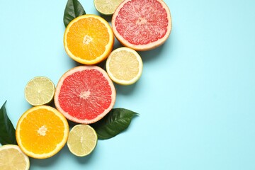 Tropical fruits on color background. Summer concept. Flat lay, top view, copy space