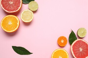 Tropical fruits on a colored background. Summer concept. Flat lay, top view, copy space