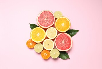Tropical fruits on a colored background. Summer concept. Flat lay, top view, copy space