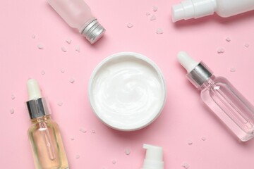 Natural cosmetic products on color background, top view