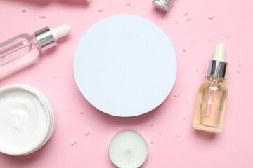 Natural cosmetic products on color background, top view