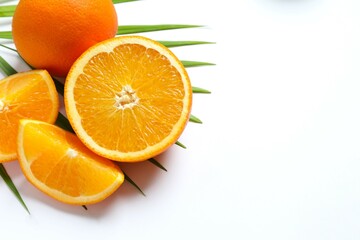 Fresh orange citrus with green leaves isolated on white background