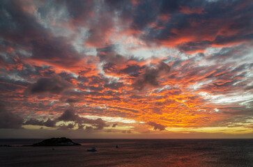 Scenic moody sunset over Anchors Bay on Lizard Island in Queensland, Australia.