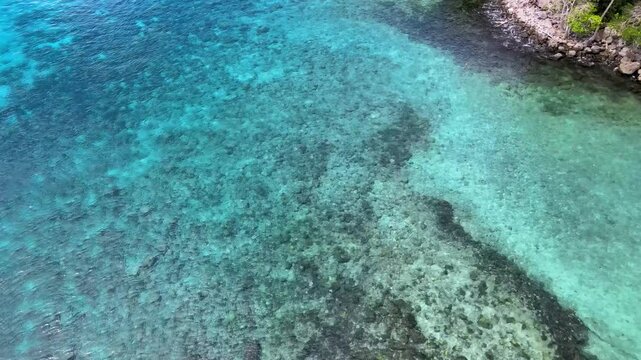 Aerial View of Coastal Rocks in Shallow Sea Water &ndash; Low Altitude Stock Footage