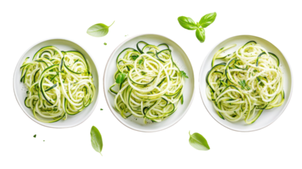 Top view of three plates with fresh zucchini noodles, healthy vegetarian meal, isolated on transparent t background